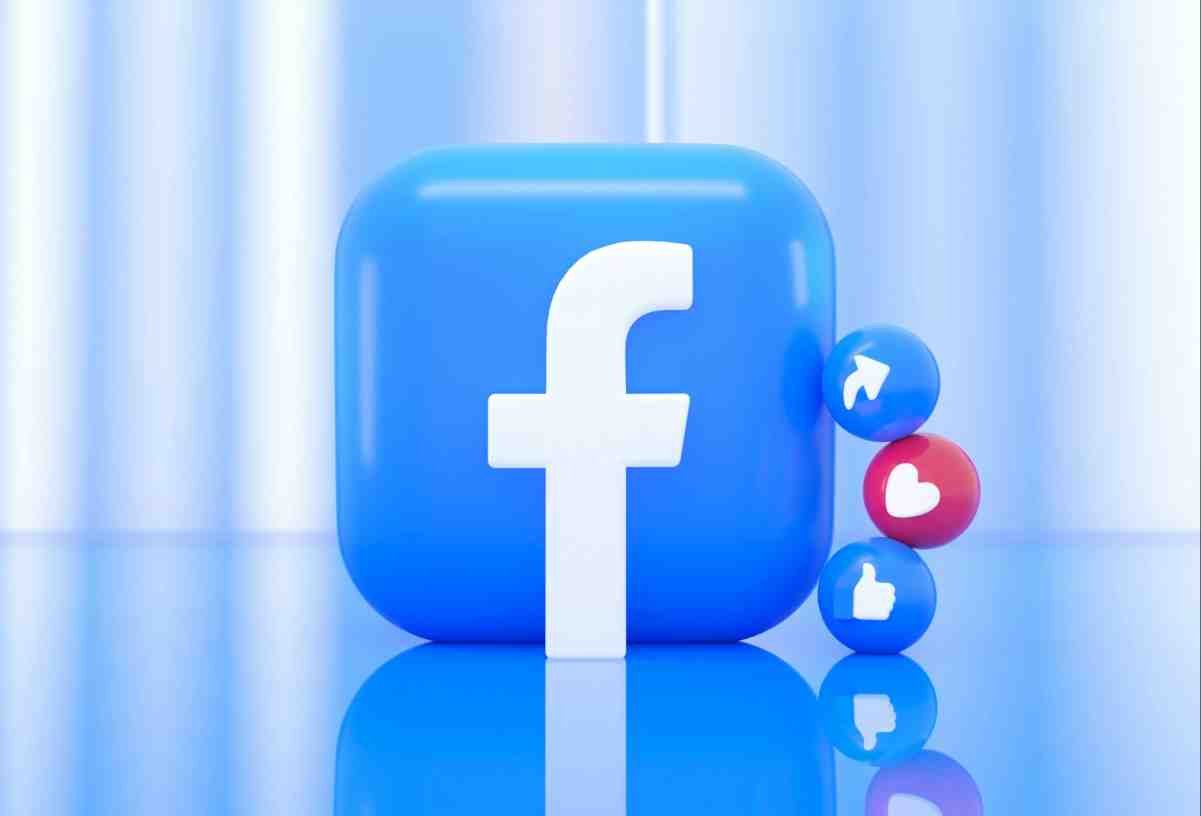 3D Facebook logo with like and share icons illustrating a Facebook Pixel Shopify setup issue
