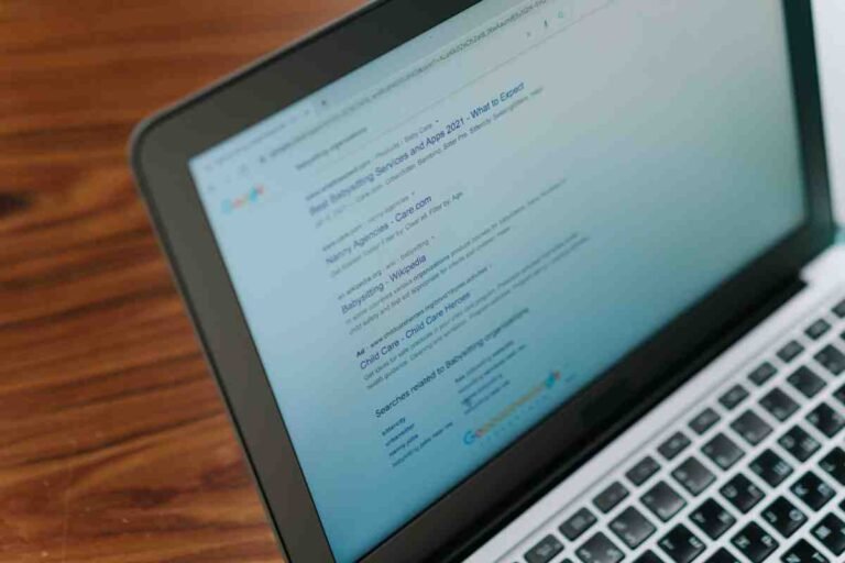 Laptop showing Google search results and related searches for keyword research for beginners