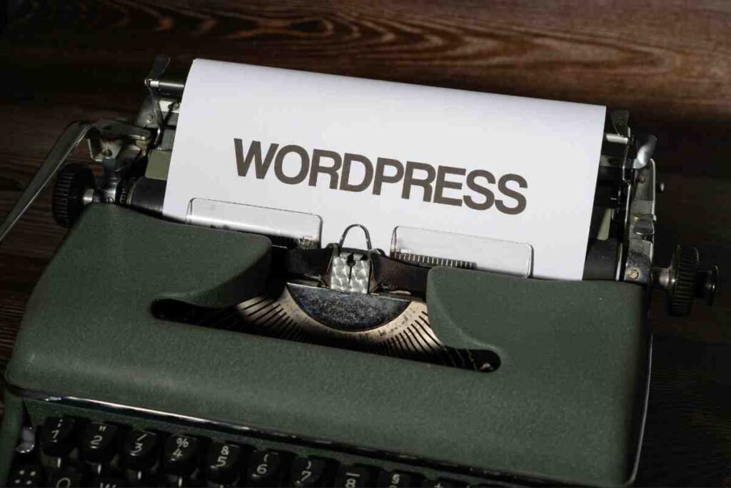 Vintage typewriter with paper reading WordPress, representing the first page of a WordPress SEO setup guide