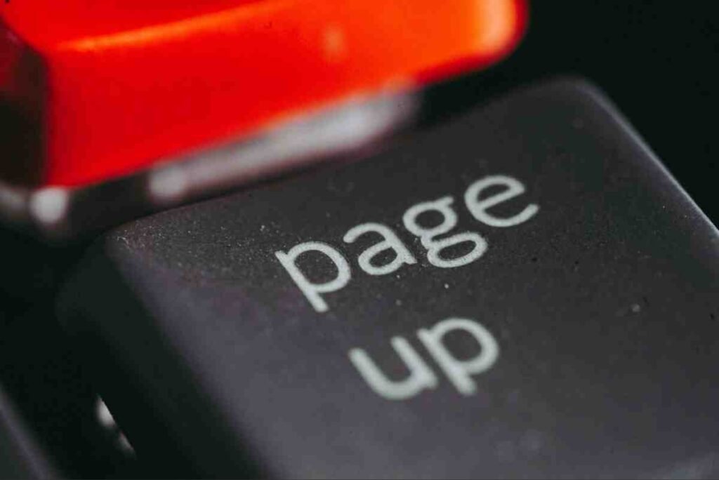Close-up of a Page Up keyboard key representing how to fix duplicate content SEO and improve rankings