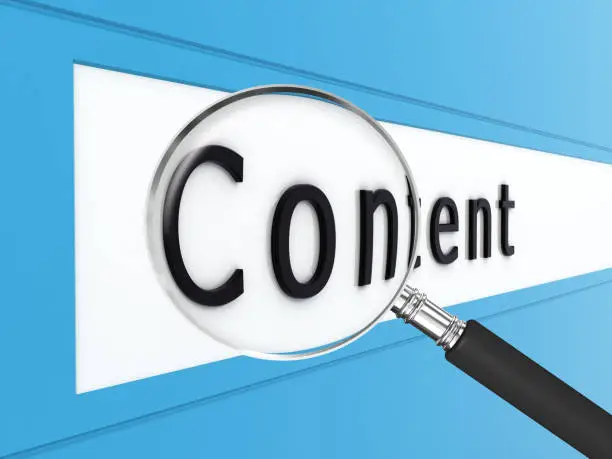 Magnifying glass over the word Content showing how to fix duplicate content SEO
